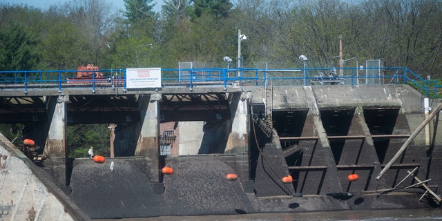 The remains of the Edenville Dam, as seen on Wednesday, May 20, 2020 in Edenville Township north of Midland.