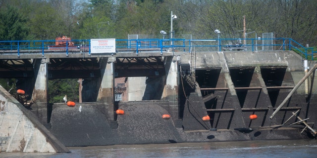 The remains of the Edenville Dam, as seen on Wednesday, May 20, 2020 in Edenville Township north of Midland.