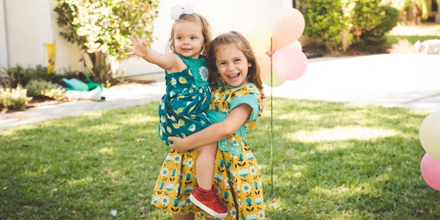 Isla Moody and one of her older sisters, pictured.