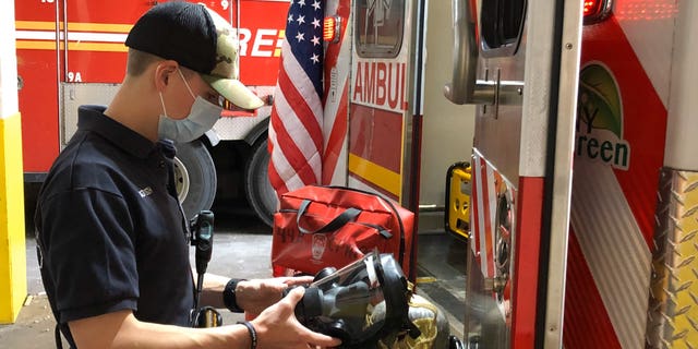 Paramedics don gowns, gloves, goggles and N95 masks before they enter a home. Six percent of the FDNY’s 4,400 EMS workers are currently on COVID 19 medical leave.