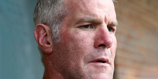 FILE - In this Oct. 17, 2018, file photo, former NFL quarterback Brett Favre speaks with reporters in Jackson, Miss., about his support for Willowood Developmental Center, a facility that provides training and assistance for special needs students, The Mississippi state auditor said Wednesday, May 6, 2020, that Favre is repaying $1.1 million he received for multiple speaking engagements where auditor’s staffers said Favre did not show up. (AP Photo/Rogelio V. Solis, File)