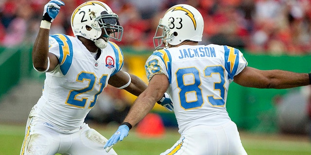 San Diego Chargers running back LaDainian Tomlinson (21) and wide receiver Vincent Jackson (83) celebrate Jackson's first-quarter touchdown against the Kansas City Chiefs. The Chargers defeated the Chiefs, 37-7, at Arrowhead Stadium in Kansas City, Missouri, Sunday, October 25, 2009. (Photo by John Sleezer/Kansas City Star/Tribune News Service via Getty Images)