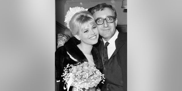 English comic actor Peter Sellers marrying Swedish actress Britt Ekland at Guildford Register Office, England, 1964.