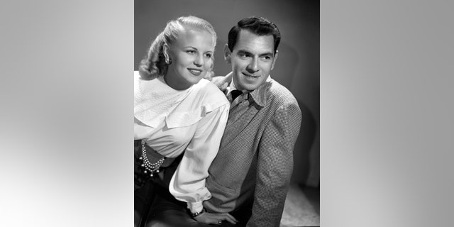 From left: Singer-songwriter Peggy Lee and orchestra leader Dave Barbour for CBS Radio's 'The Electric Hour Summer Series' music program. Hollywood, CA. Image dated May 1, 1947.