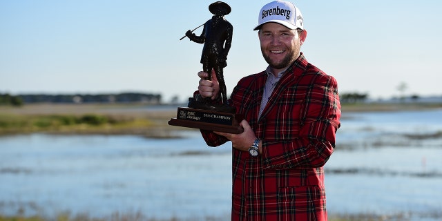 Branden Grace of South Africa poses with the trophy after winning the 2016 RBC Heritage at Harbour Town Golf Links on April 17, 2016 in Hilton Head Island, S.C. (Photo by Jared C. Tilton/Getty Images)