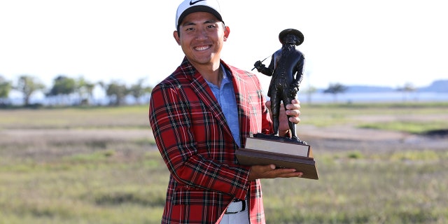 C.T. Pan of Taiwan poses with the trophy after winning the 2019 RBC Heritage at Harbour Town Golf Links on April 21, 2019 in Hilton Head Island, S.C. (Photo by Streeter Lecka/Getty Images)