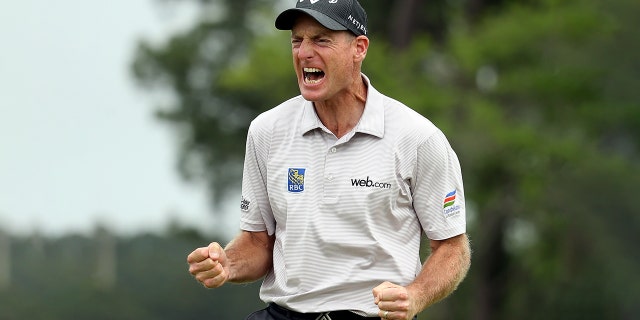 Jim Furyk makes a birdie putt on the second playoff hole against Kevin Kisner to win the RBC Heritage at Harbour Town Golf Links on April 19, 2015 in Hilton Head Island, S.C. (Photo by Streeter Lecka/Getty Images)