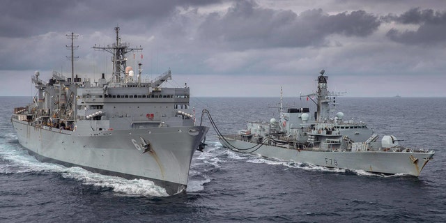 The Duke-class frigate HMS Kent takes part in a replenishment-at-sea with Supply-class fast combat support ship USNS Supply whilst on exercise with the U.S. Navy in the Arctic Circle on May 4. (Dan Rosenbaum, HMS Kent)