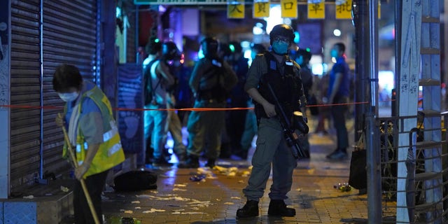 A pro-democracy movement that paralyzed Hong Kong for months last year has shown signs of reviving in recent weeks as the coronavirus threat eases. In this photo, police arrest pro-democracy protesters on Monday. (AP)