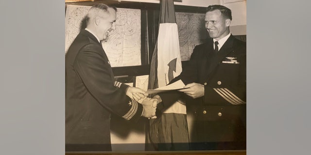 Owin Chance (right) ranks up to Chief Warrant Officer. Family members say that Chance described this as one of his proudest days in the United States Navy. (Photo provided by the Chance Family).