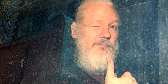 WikiLeaks founder Julian Assange arrives at the Westminster Magistrates Court, after he was arrested in London, Britain April 11, 2019.