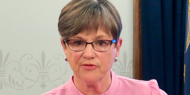 Kansas Gov. Laura Kelly answers questions about the coronavirus during a news conference, Tuesday, May 19, 2020, at the Statehouse in Topeka, Kan.