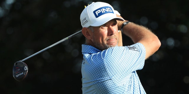 Lee Westwood of England plays his shot from the 14th tee during the final round of the Honda Classic at PGA National Resort and Spa Champion course on March 01, 2020 in Palm Beach Gardens, Florida.