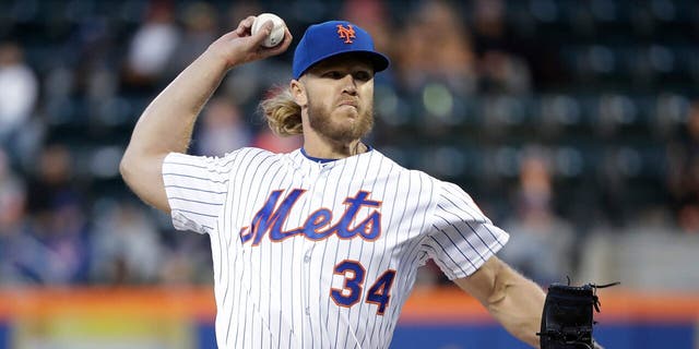 Mets' Noah Syndergaard delivers a pitch against the Minnesota Twins on April 10, 2019, in New York.
