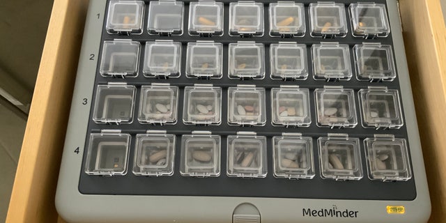 This automated pill dispenser by MedMinder helps organize prescription medications for seniors, sending alerts if medications are not taken on time.