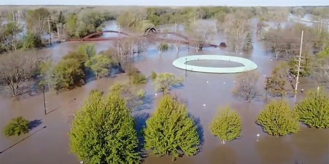 This footage, filmed by Anthony Clark on May 20, shows an aerial view of Floodwaters in Midland, Mich. can be seen on May 20, after two dams in were overtaken following heavy rainfall, forcing the evacuation of communities downstream.