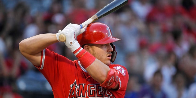 In this July 25, 2019, file photo, Los Angeles Angels' Mike Trout bats during the first inning of the team's baseball game against the Baltimore Orioles in Anaheim, California. (WHD Photo/Mark J. Terrill, File)