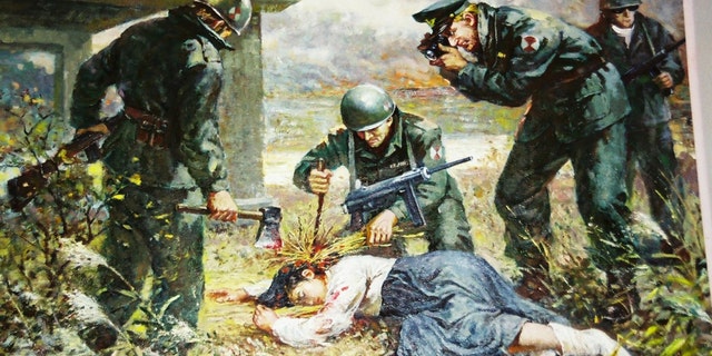 A painting displayed at a North Korean museum showing Westerners attacking a Korean girl.