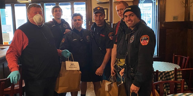 Mike "Red" Walsh, far left, is using his New York Yankees connections to feed New York City first responders while helping to keep a favorite pub in business during the coronavirus pandemic. (Mike "Red" Walsh)