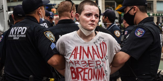 Police detaining a protesters in New York City as tensions escalated over the death of George Floyd. (Stephanie Keith/Getty Images)