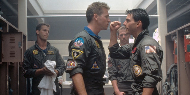 American actors Val Kilmer and Tom Cruise appear on the set of the original "Top Gun," directed by Tony Scott.