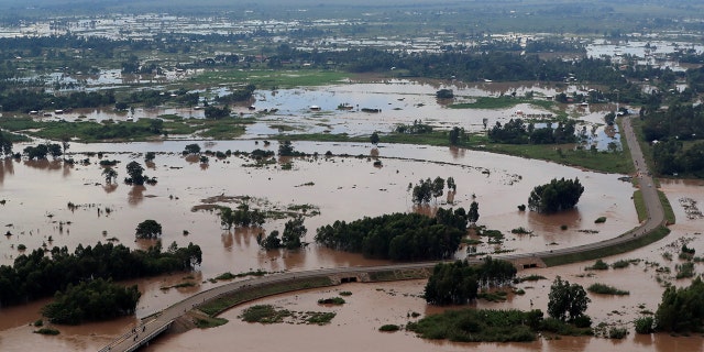 An aerial view shows flood waters near the Sigiri bridge, after River Nzoia burst its banks and due to heavy rainfall and the backflow from Lake Victoria, in Budalangi within Busia County, Kenya May 3.