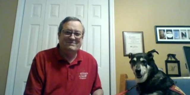 Canines for Christ Chaplain Ron Leonard and his therapy dog Molly.