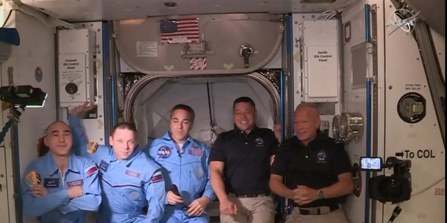 NASA astronauts board ISS on historic SpaceX mission
