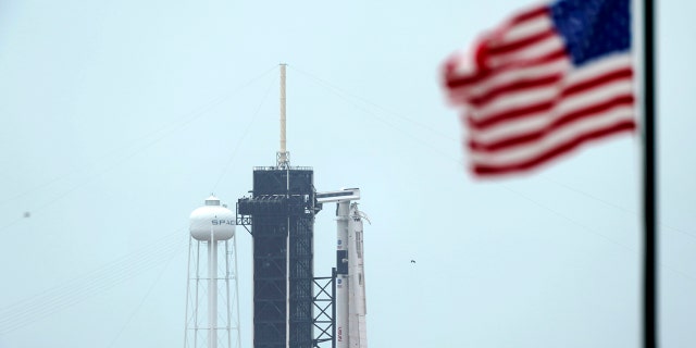 The SpaceX Falcon 9, with the Crew Dragon spacecraft on top of the rocket, sits on Launch Pad 39-A May 25, at Kennedy Space Center, Fla.
