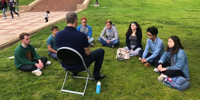 Rep. Tim Ryan, D-Ohio, meditating with students at UCLA. (Photo courtesy of Rep. Tim Ryan's office.)