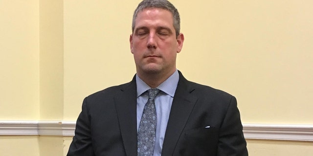 Rep. Tim Ryan, D-Ohio, meditating.