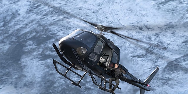 Tom Cruise hangs from a helicopter in 'Mission: Impossible Fallout.'