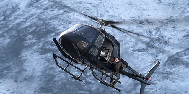 Tom Cruise hangs from a helicopter in 'Mission: Impossible Fallout.'