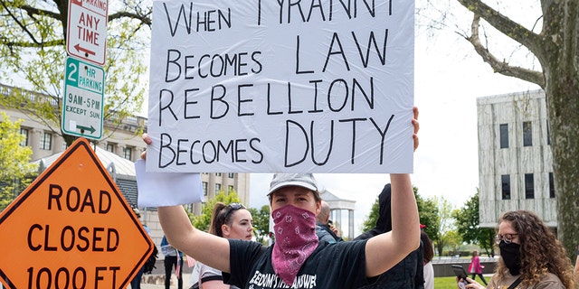 Protests have broken out in states like New Jersey that have yet to give residents a clear date as to when most of its economy will reopen. (Barcroft Media via Getty Images)