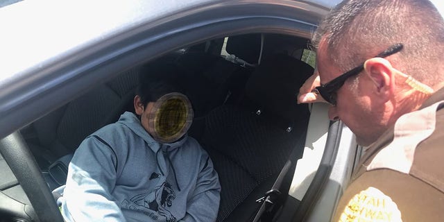 A 5-year-old boy was caught driving his parents’ car on Monday, May 4, 2020, on a freeway in Utah — apparently on his way to California to buy a Lamborghini. (Utah State Police/Twitter)