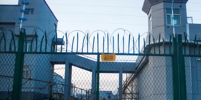 A perimeter fence is constructed around what is officially known as a vocational skills education centre in Dabancheng in Xinjiang Uighur Autonomous Region, China Sept. 4, 2018. This centre, situated between regional capital Urumqi and tourist spot Turpan, is among the largest known ones, and was still undergoing extensive construction and expansion at the time the photo was taken.  (REUTERS/Thomas Peter)