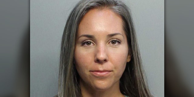 Kimberly Falkenstine was arrested after refusing to leave the beach, police said.