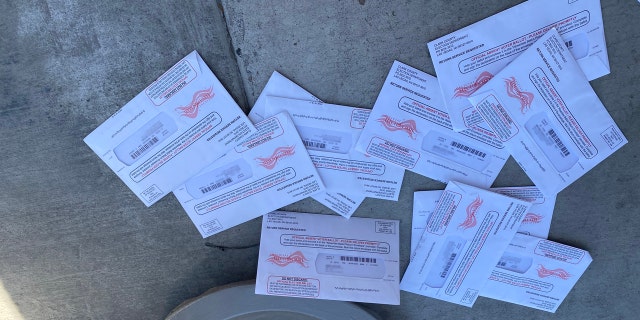 Nevada's vote-by-mail primary stirs fraud concerns, as unclaimed ballots pile up: 'Something stinks here' 3 Ballots laying on the sidewalk outside an apartment complex in Las Vegas. (Photo Courtesy of Jim M.)