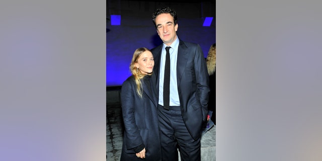 Mary-Kate Olsen, left, and Olivier Sarkozy attend the launch of Just One Eye's Ulysses Tier 1: The Ultimate Disaster Relief Kit on December 5, 2014, in Los Angeles, Calif. 