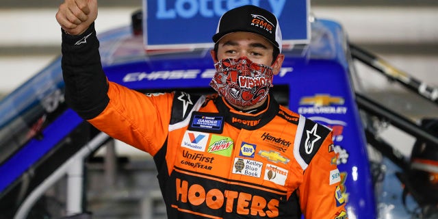 Chase Elliott celebrates after winning the NASCAR Truck Series automobile race at Charlotte Motor Speedway on Tuesday May 26, 2020 in Concord, NC (Associated Press).
