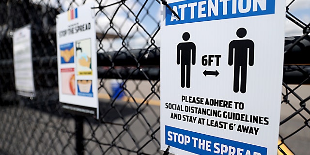 DARLINGTON, SOUTH CAROLINA - MAY 16: Social distancing signage at the Darlington Raceway as it prepares to re-open tomorrow for the NASCAR Cup Series The Real Heroes 400, the first professional motorsport to resume the season after the nationwide lockdown due to the ongoing Coronavirus (COVID-19) on May 16, 2020 in Darlington, South Carolina. (Photo by Chris Graythen/Getty Images)