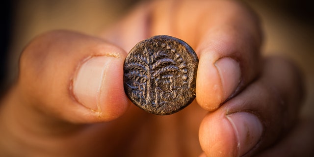 Bar Kokhba revolt coin inscribed with the word "Jerusalem" and a picture of a date palm.
