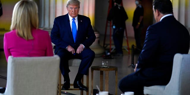 President Donald Trump speaks during a Fox News virtual town hall from the Lincoln Memorial, Sunday, May 3, 2020, in Washington, co-moderated by FOX News anchors Bret Baier and Martha MacCallum. (AP Photo/Evan Vucci)