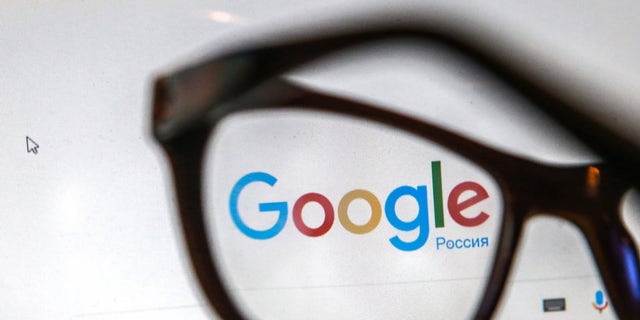 ST PETERSBURG, RUSSIA - NOVEMBER 16, 2016: Glasses on a computer screen showing the logo and search box of the Google search engine. Sergei Konkov/TASS 