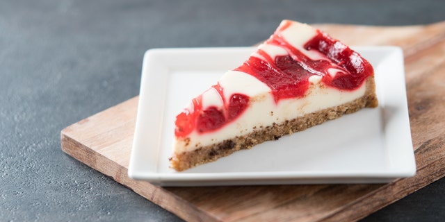 This lovely slice of cheesecake shows off touches of strawberry and raspberry on top — the swirl effect is always an option, too. 