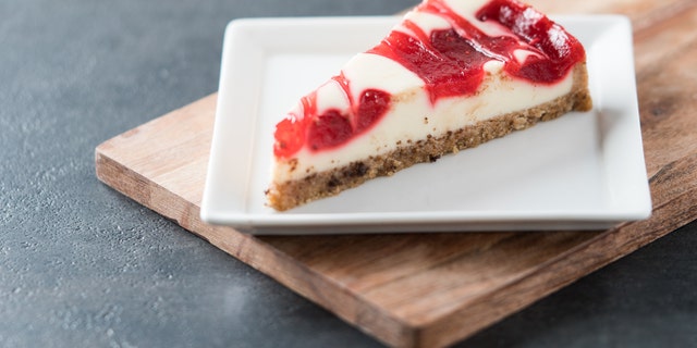 This lovely slice of cheesecake shows off touches of strawberry and raspberry on top — the swirl effect is always an option, too.
