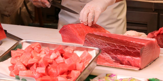 The fishing group worked with a local seafood distributor (not pictured) to help turn the fish into poke bowls for medical workers.