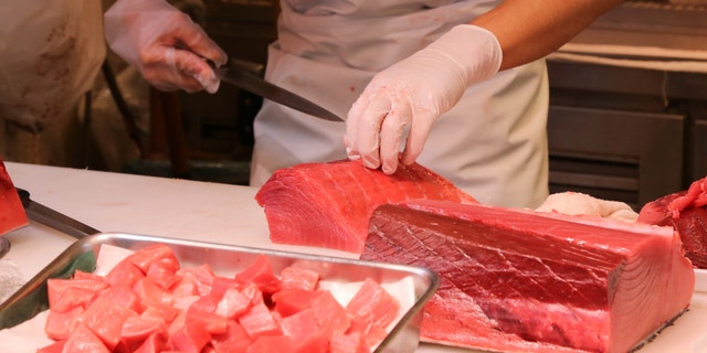 The fishing group worked with a local seafood distributor (not pictured) to help turn the fish into poke bowls for medical workers.