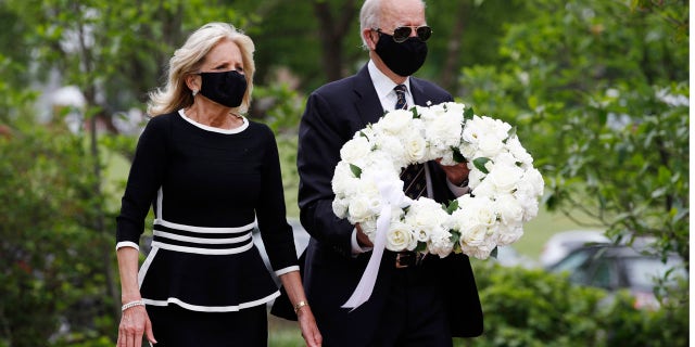 Democratic presidential candidate, former Vice President Joe Biden and Jill Biden, arrive to lay a wreath at the Delaware Memorial Bridge Veterans Memorial Park, Monday, May 25, 2020, in New Castle, Del. (AP Photo/Patrick Semansky)