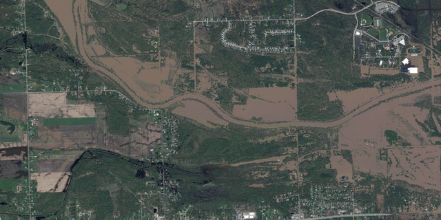 Flooding along the Tittabawassee River in central Michigan as seen in this satellite photo from Maxar on Thursday.